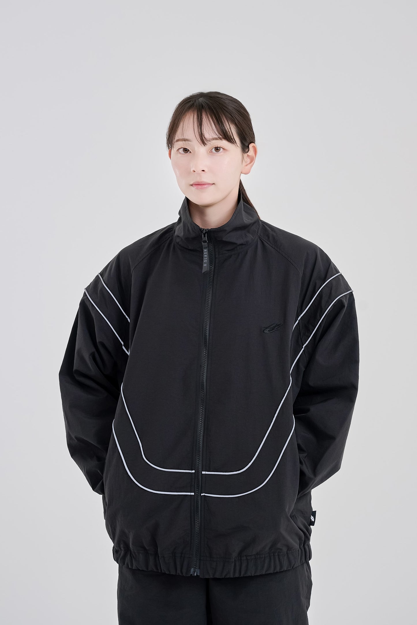 Reflective woven track jacket
