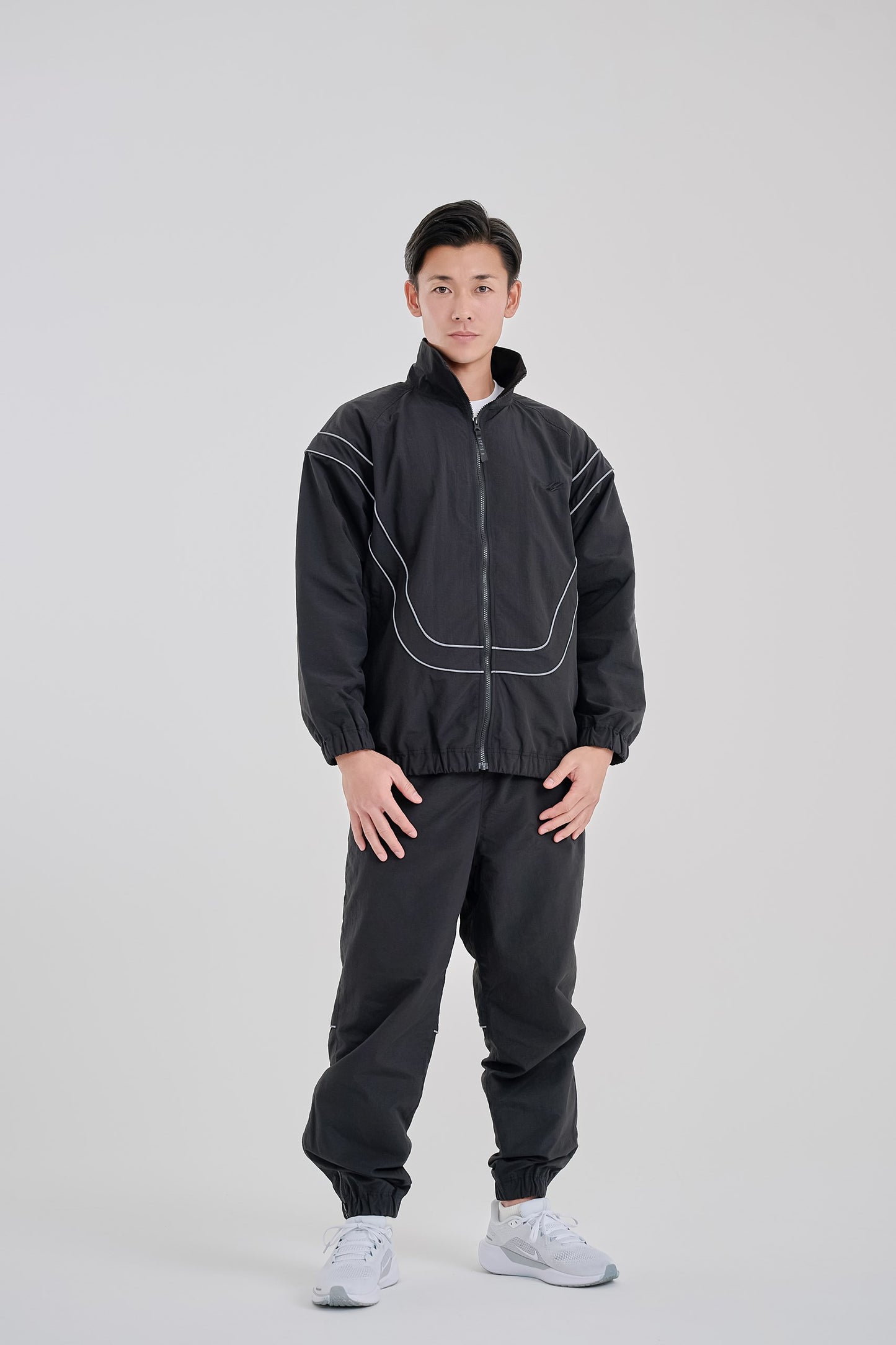 Reflective woven track jacket