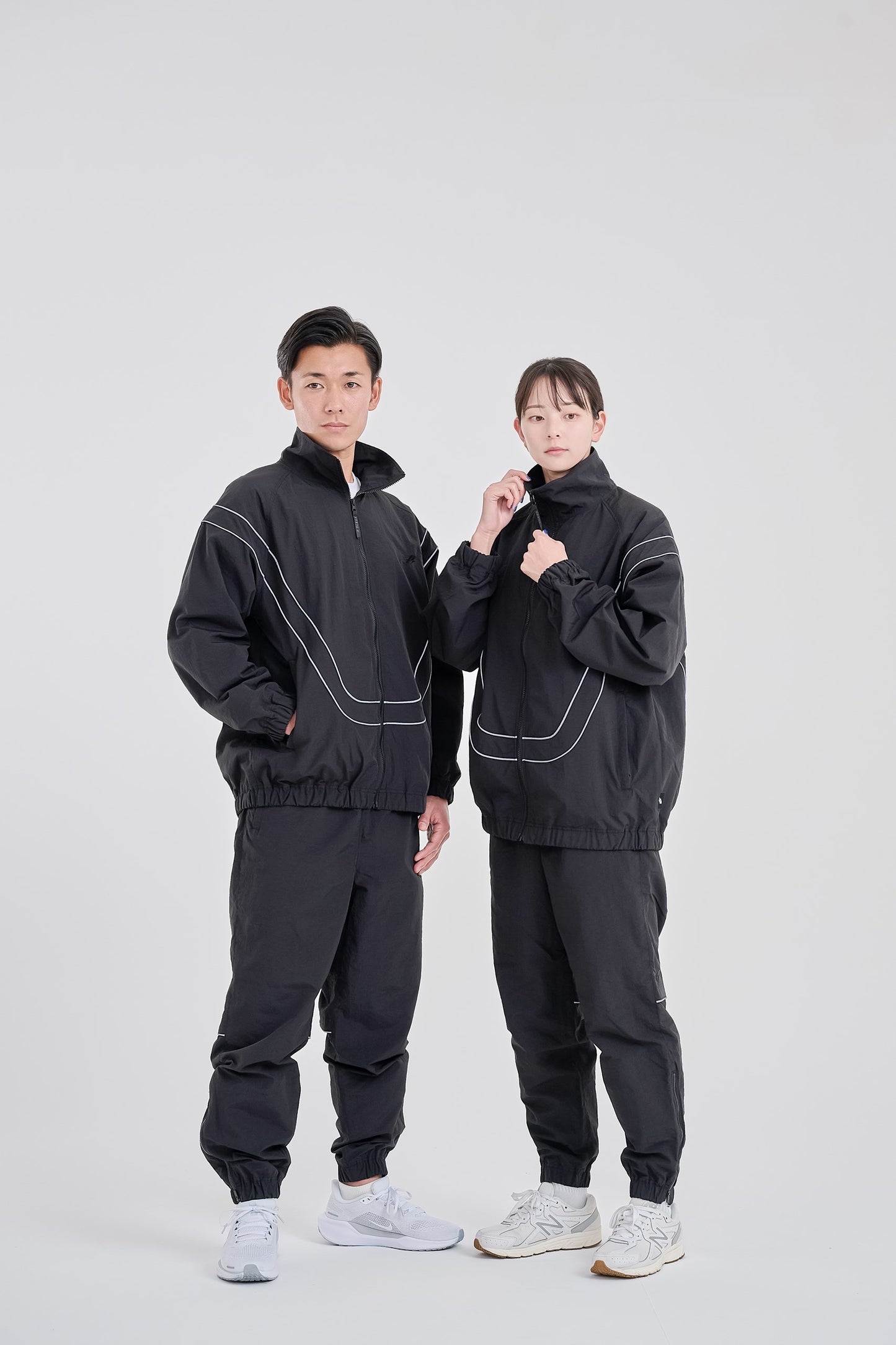 Reflective woven track jacket