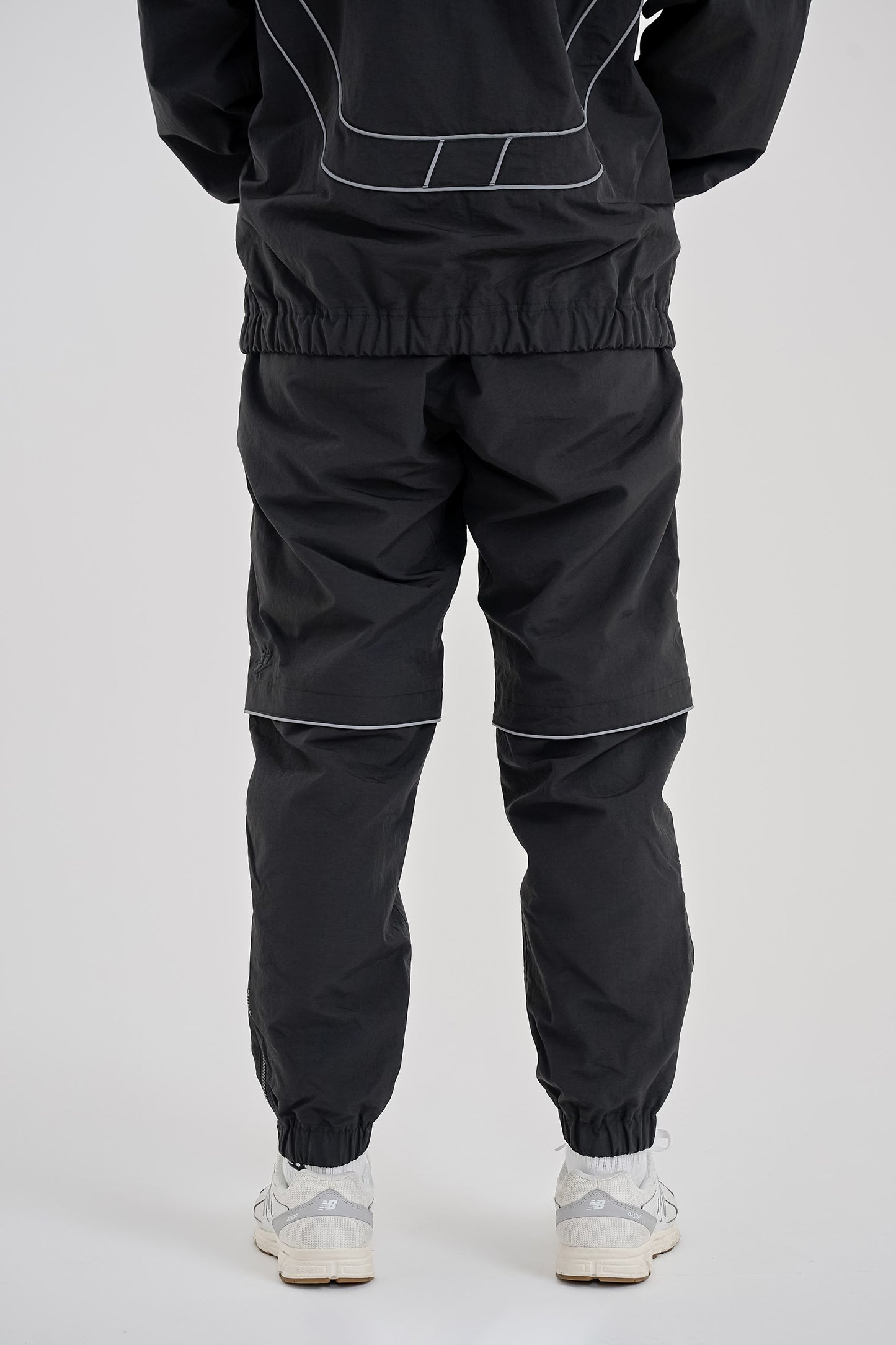 Reflective woven track pants