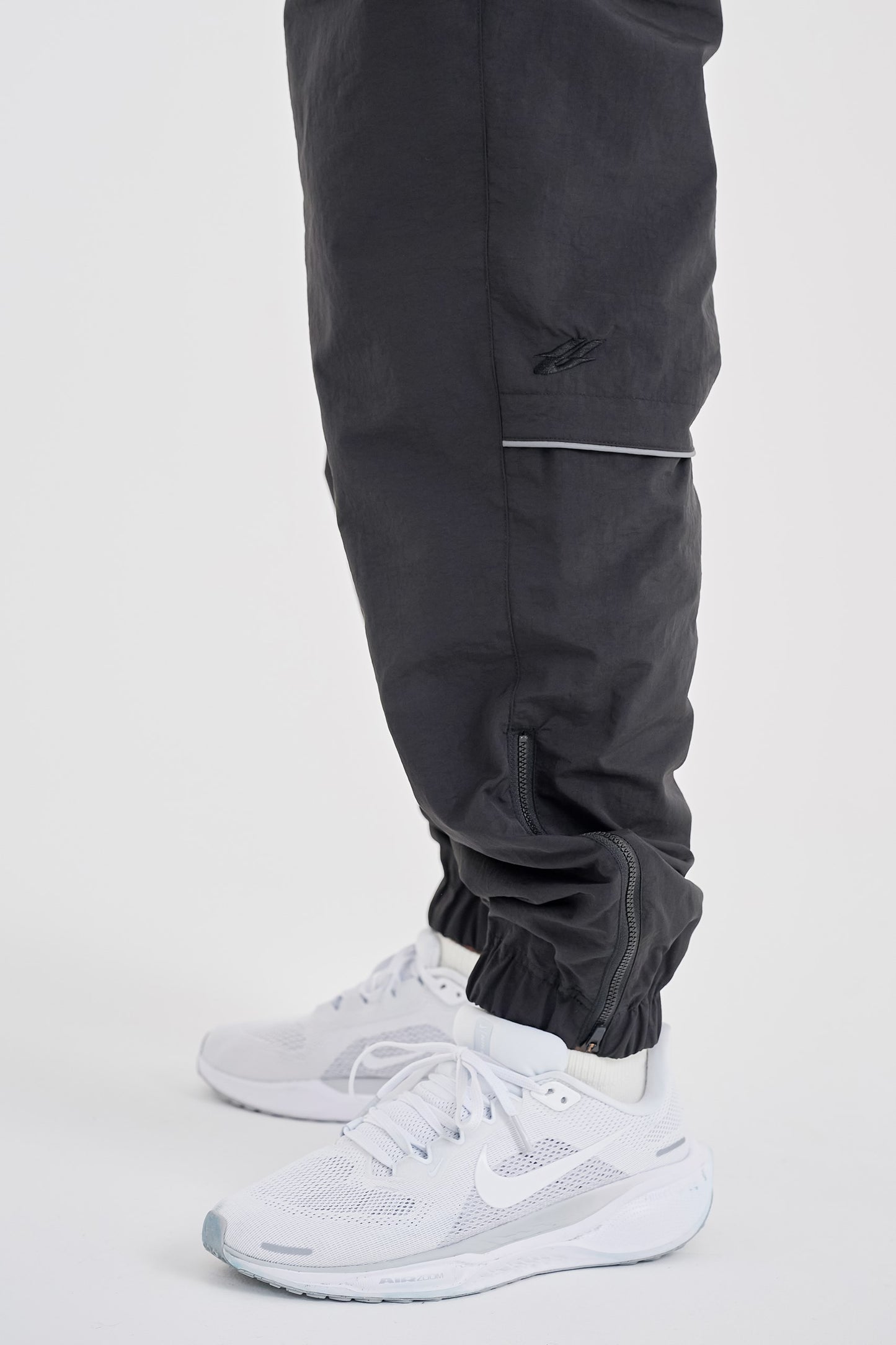 Reflective woven track pants