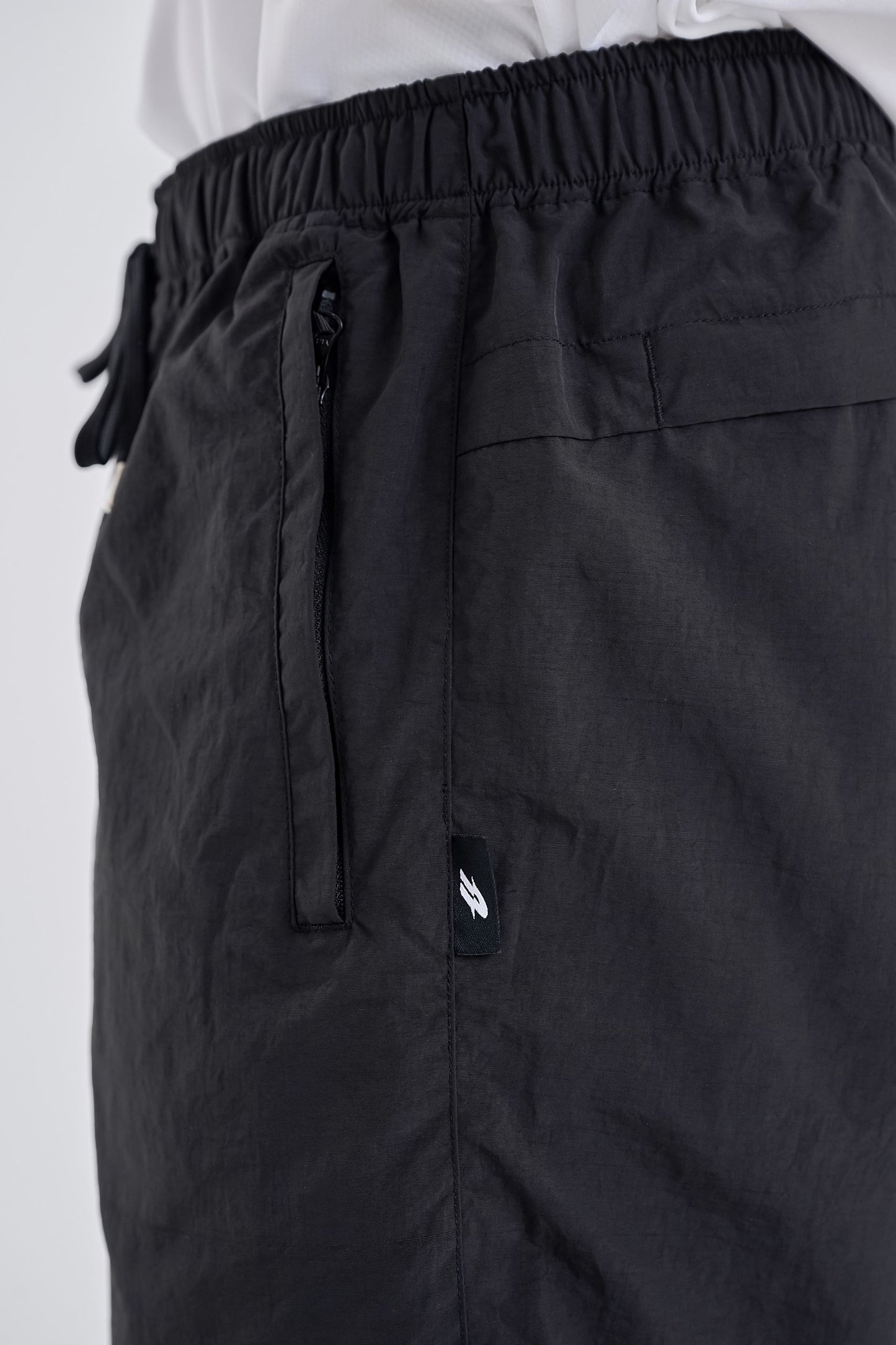 Reflective woven track pants