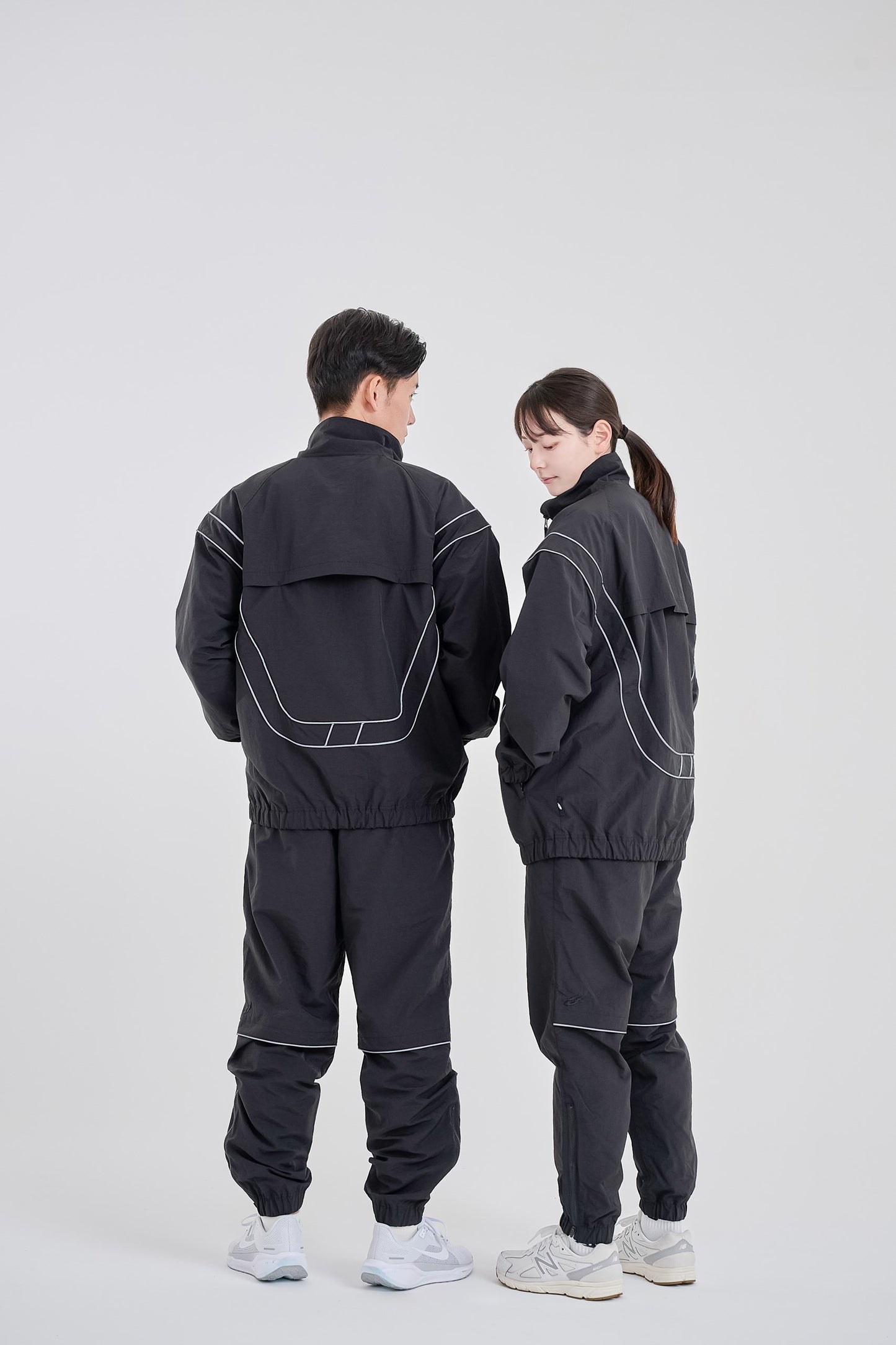 Reflective woven track pants