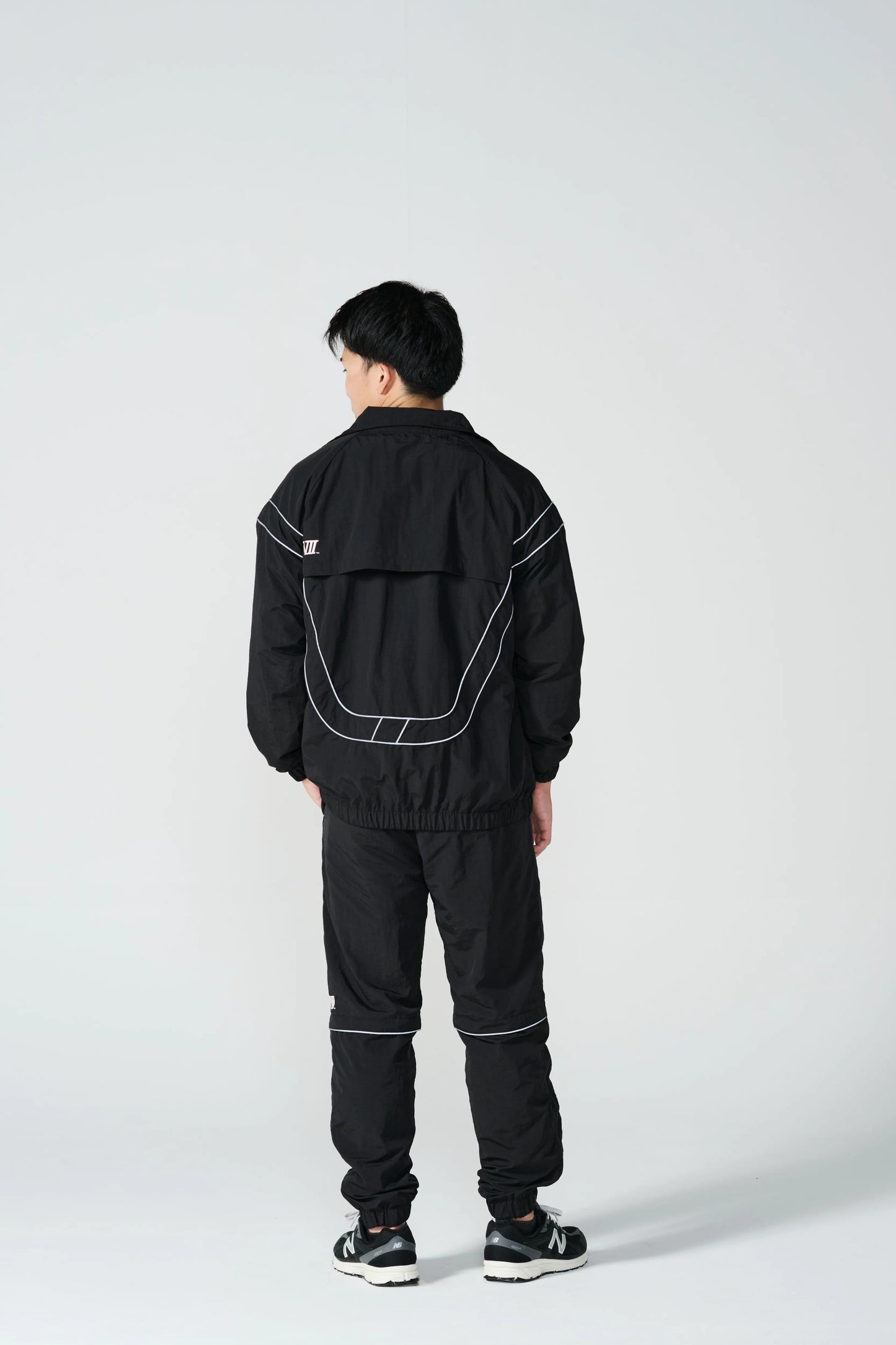 UT5S-F01Reflective woven track pants