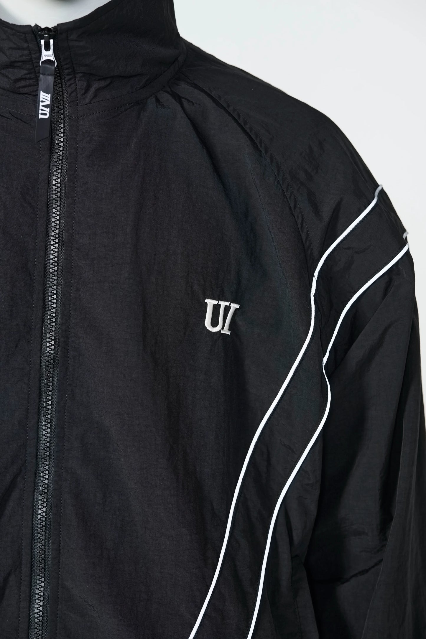 UT5S-E01Reflective woven track jacket